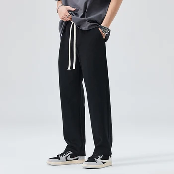 Новые длинные брюки известного корейского дизайна для мужчин 2023 года, винтажные повседневные широкие брюки с эластичной резинкой на талии.
